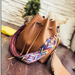 Bucket bag purse with tribal strap